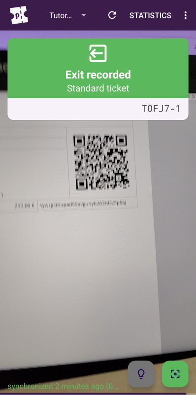 Home screen of pretixSCAN displaying a green box saying 'Exit recorded' and listing the name and ticket code.